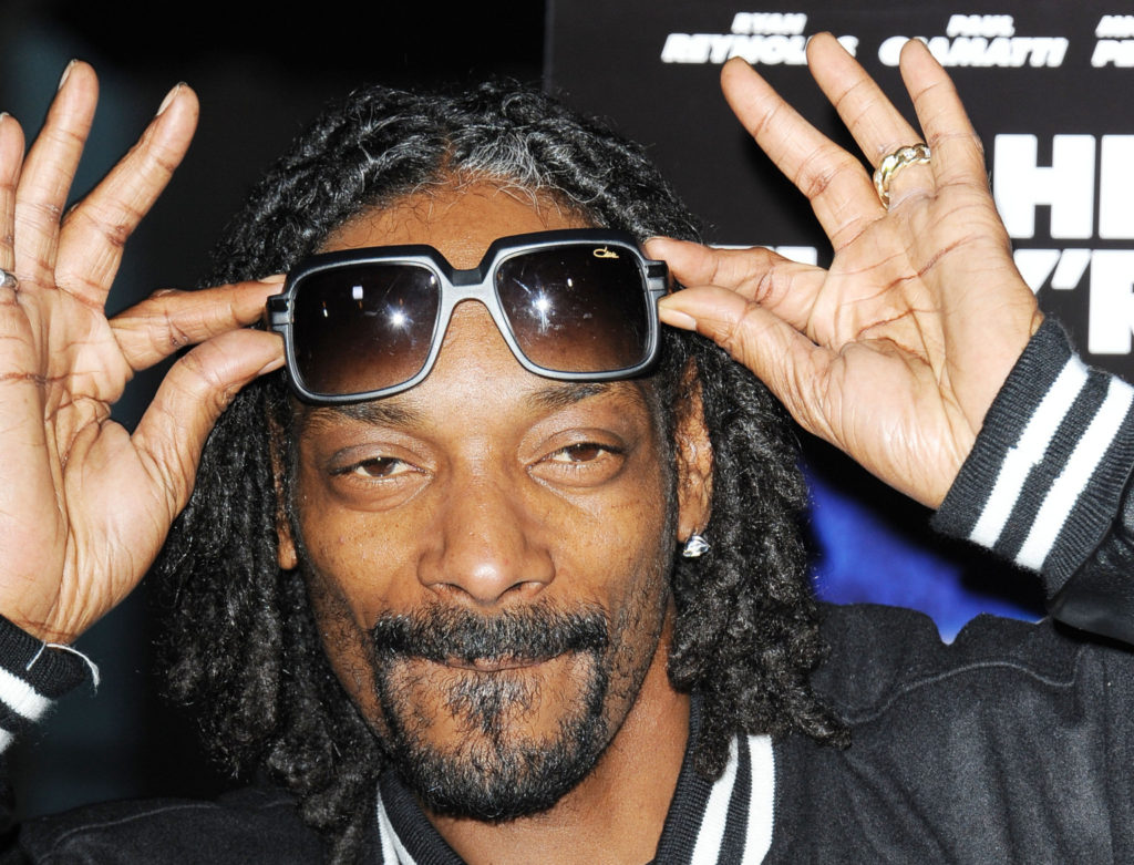 Calvin Cordozar Broadus, Jr., known as Snoop Dogg, attends the Snoop Dogg and The Snoop Youth Football League's special screening of "Turbo" at the ArcLight Hollywood on Tuesday, July 16, 2013 in Los Angeles. (Photo by Katy Winn/Invision/AP)